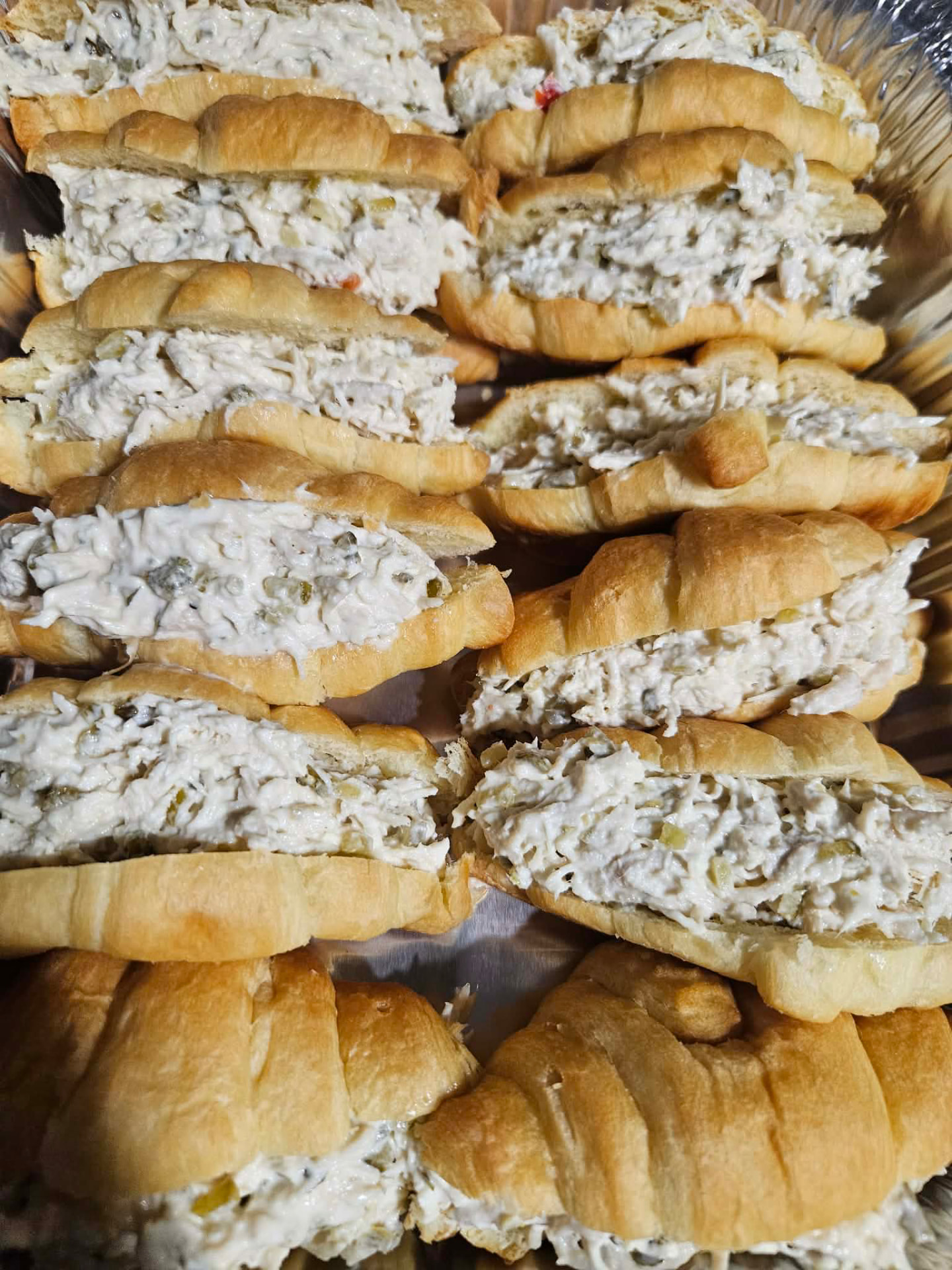 Chicken salad croissants, tray after tray
