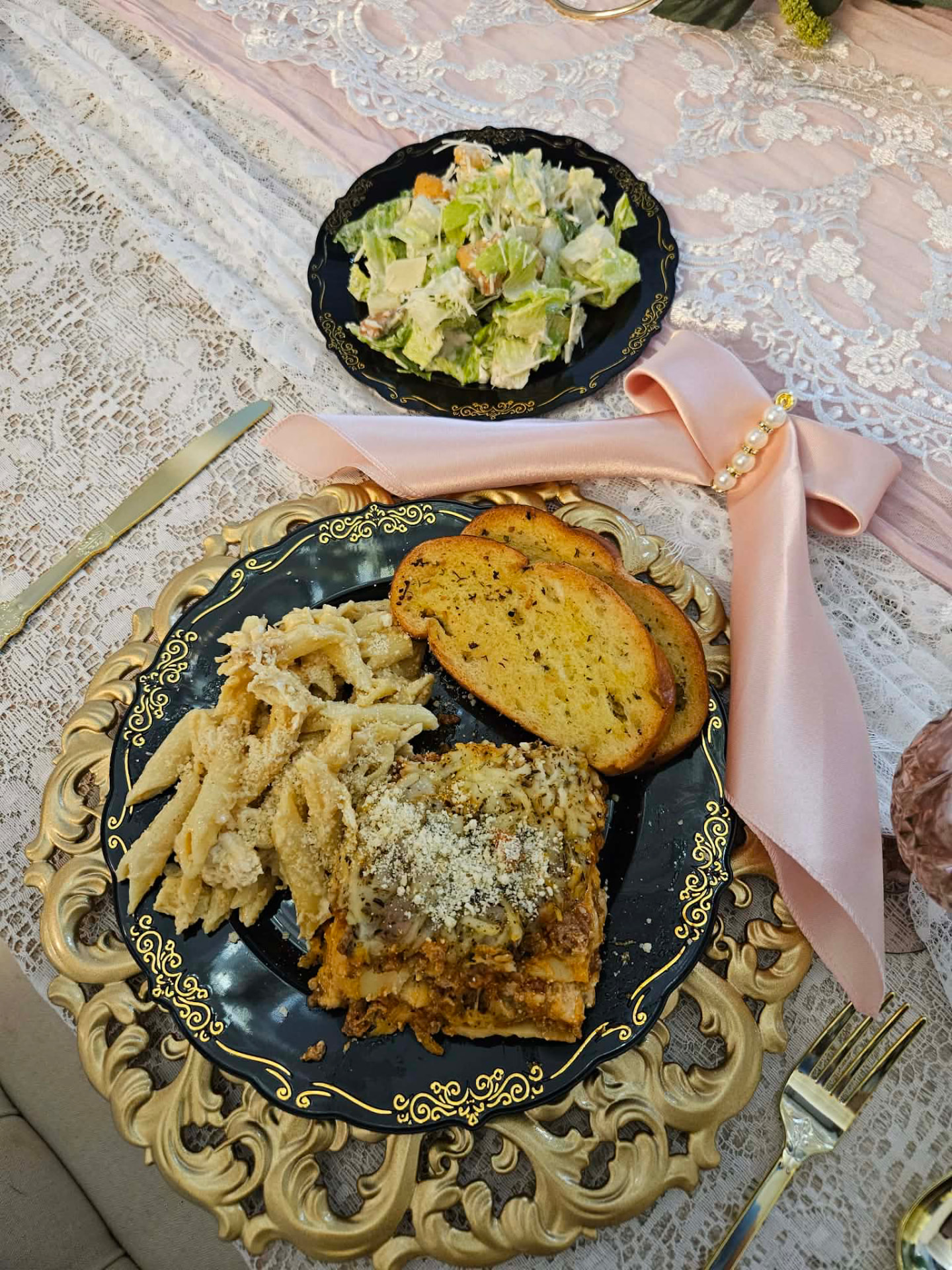Cater It pasta plate with lasagna, alfredo penne, garlic bread and Caesar salad